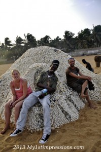 Jo and Erna with a local on Lomé beach