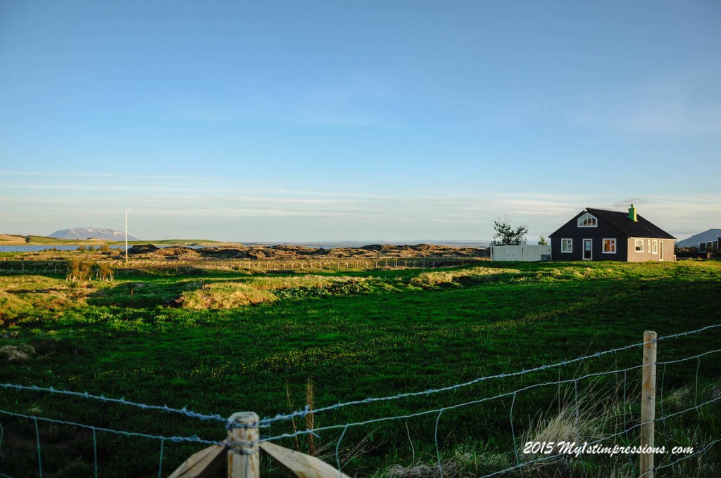 Nordic view. A typical Icelandic house in the Midnight Sun